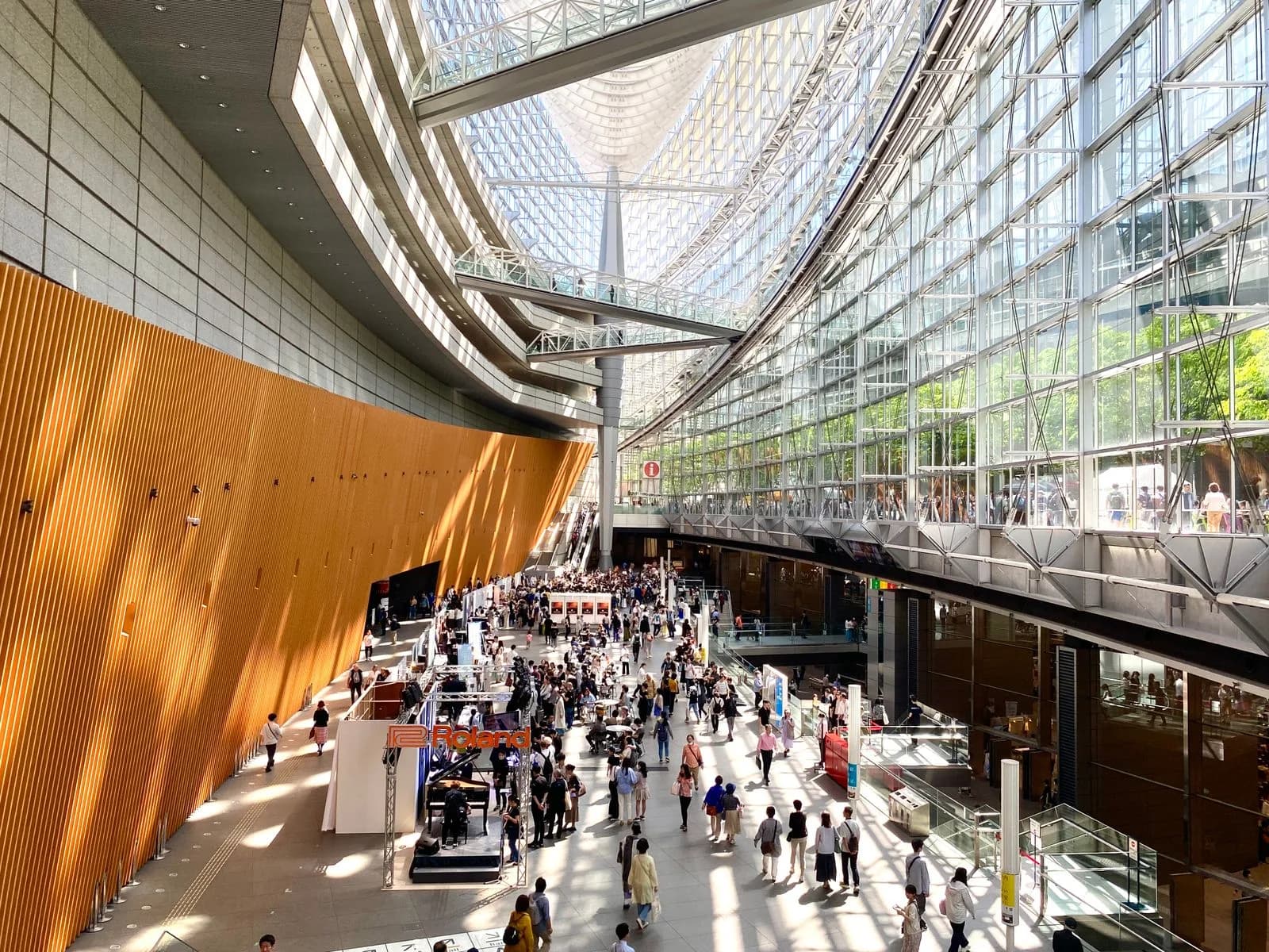 Visitors inside the Tokyo International Forum exhibition hall