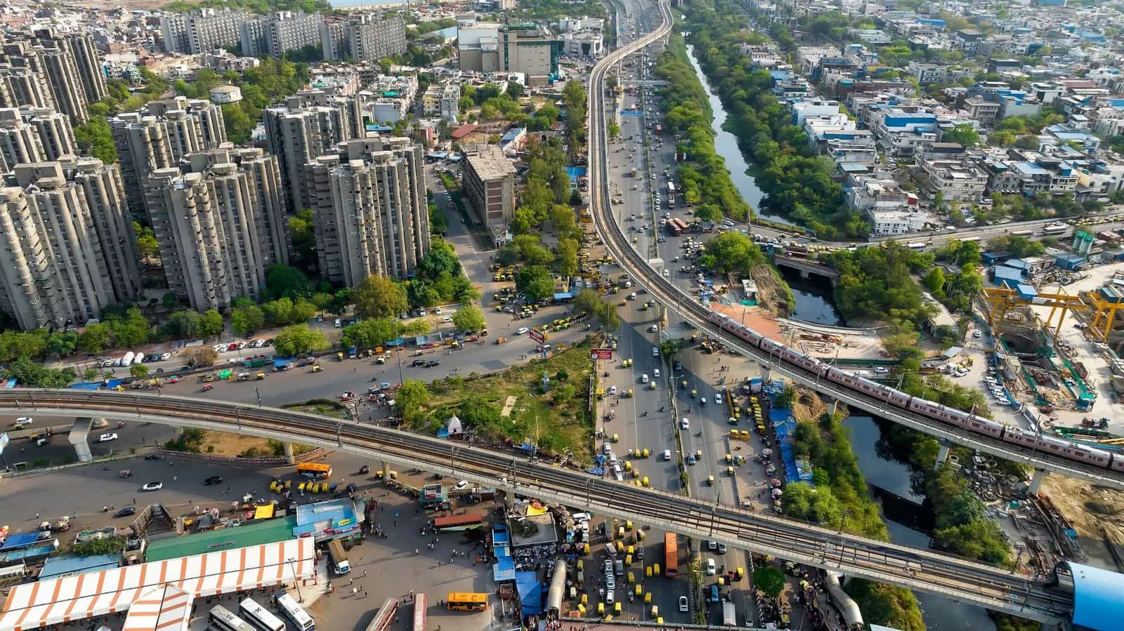 Aerial view of a dense urban landscape with roads and buildings